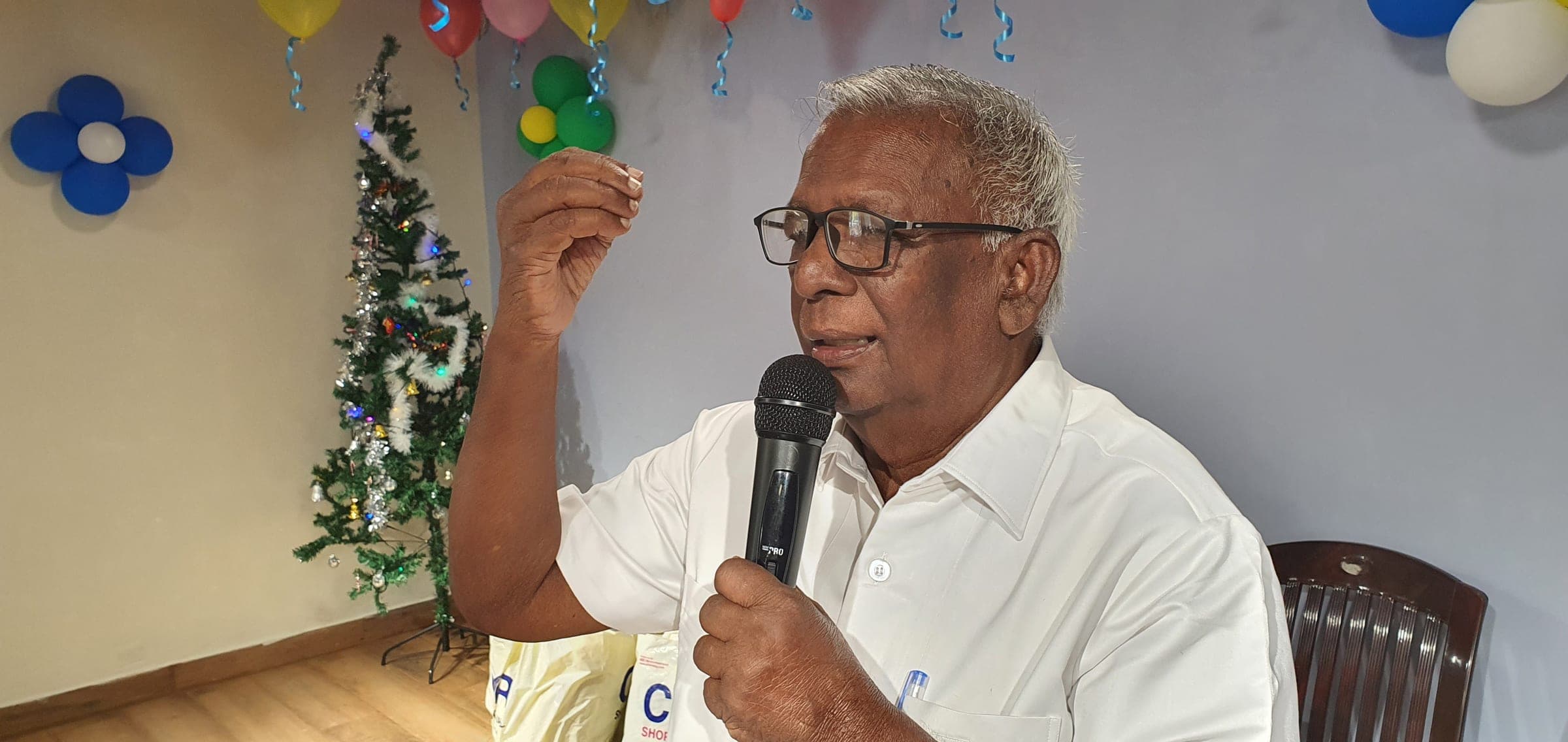 A church elder sharing a message